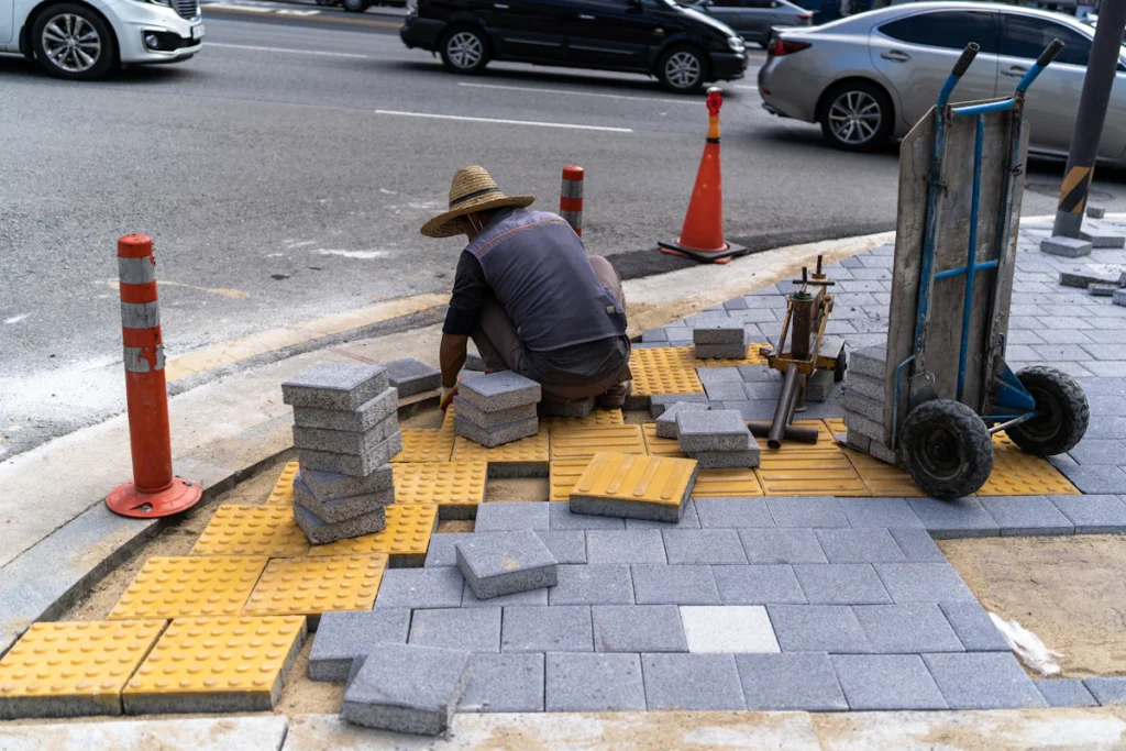 Paver removal and replacement along a commercial sidewalk